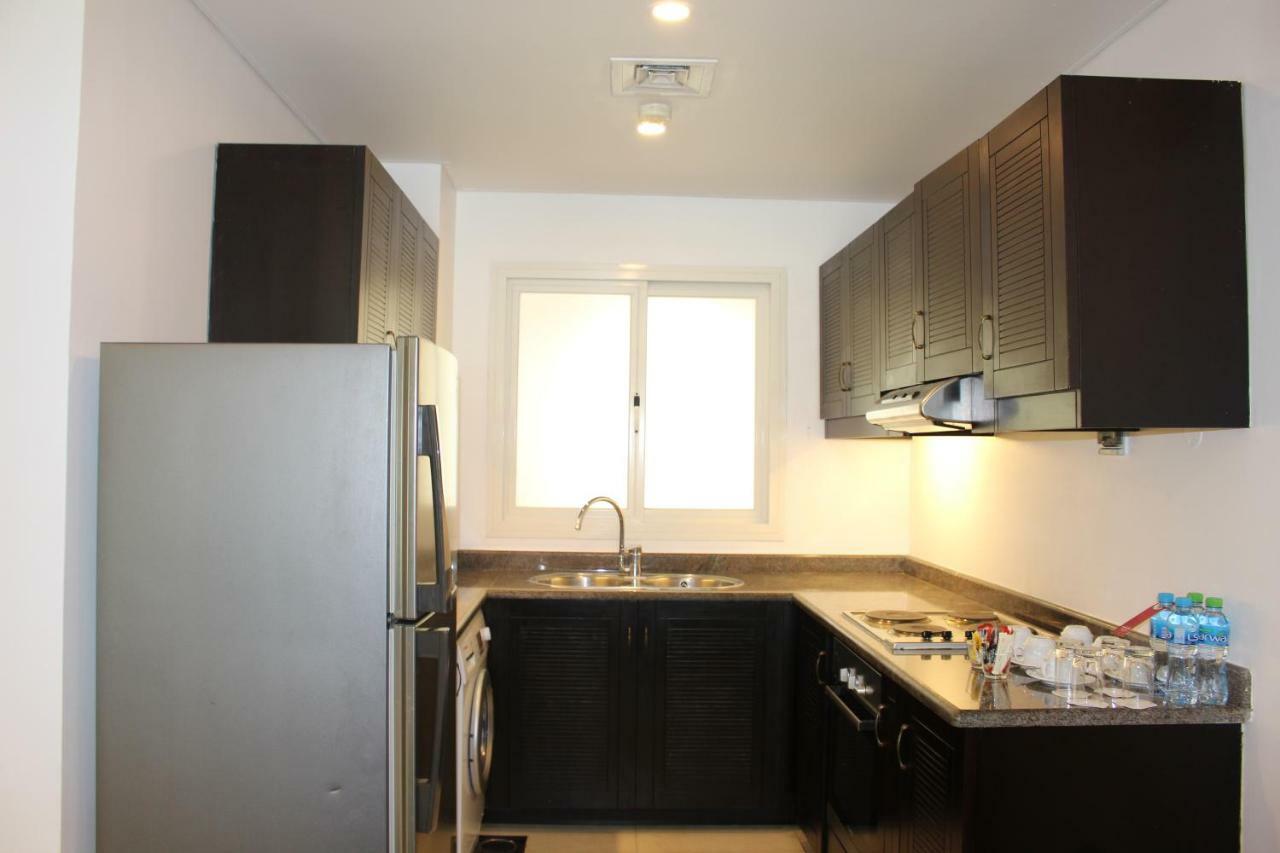 Mövenpick Hotel&Resort Al Bida'a Salmiya Exteriör bild A typical kitchen in a residential apartment